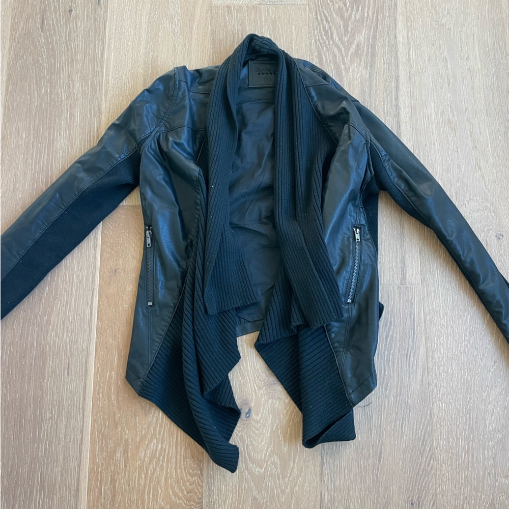 Black Leather Jacket with Ribbed Sweater Accents
